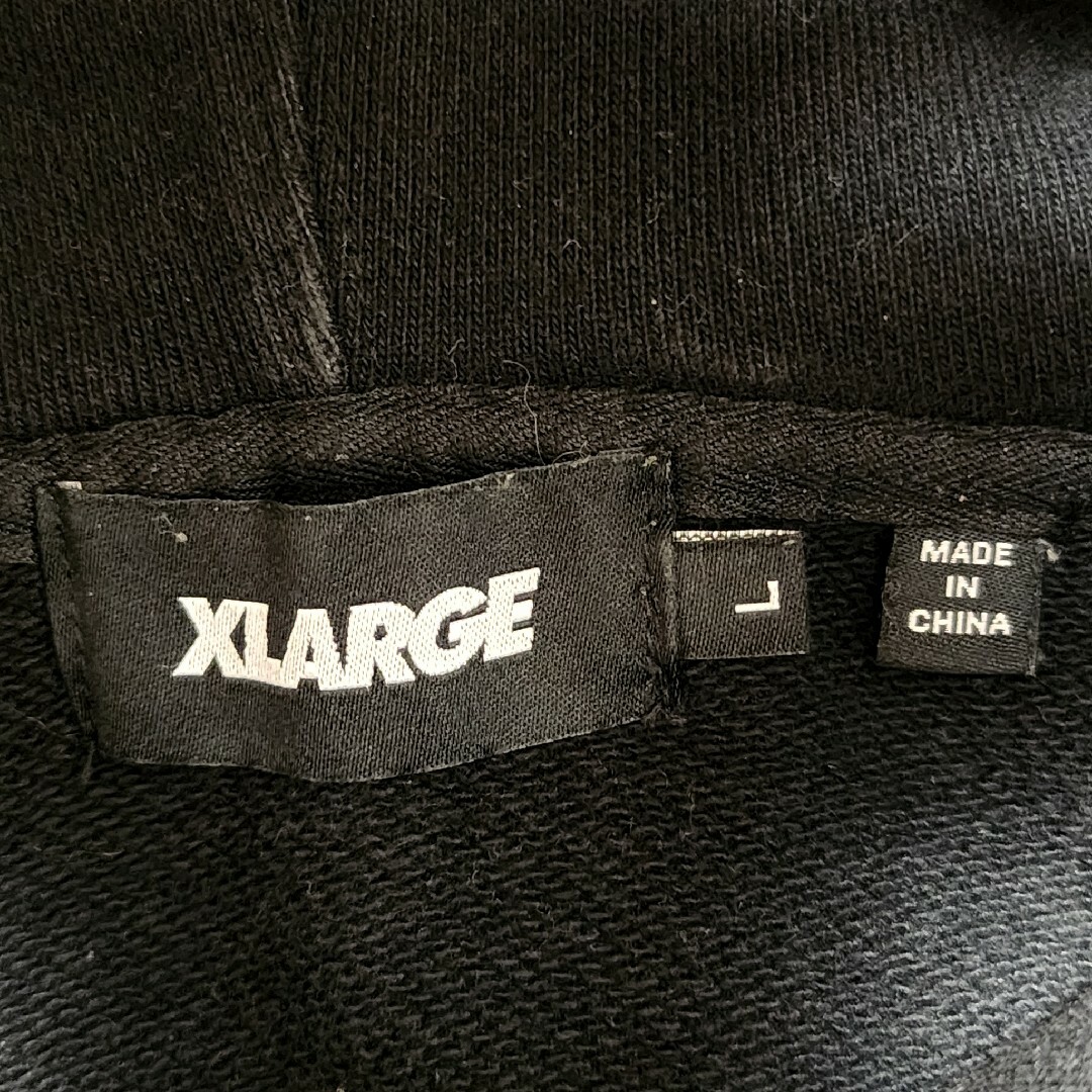XLARGE(エクストララージ)の超希少 XLARGE エクストララージ パーカー ブラック 総柄 ゆるだぼ L メンズのトップス(パーカー)の商品写真