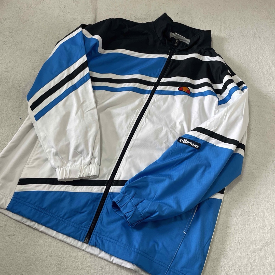 ellesse(エレッセ)のellesse エレッセ （メンズ/ユニ) チームウインドアップジャケット M スポーツ/アウトドアのテニス(ウェア)の商品写真