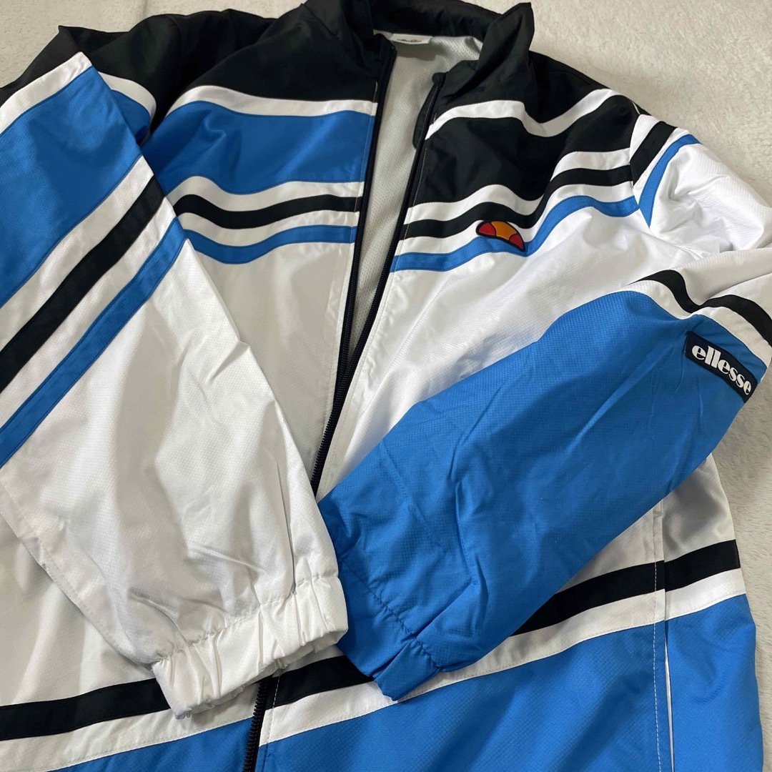 ellesse(エレッセ)のellesse エレッセ （メンズ/ユニ) チームウインドアップジャケット M スポーツ/アウトドアのテニス(ウェア)の商品写真