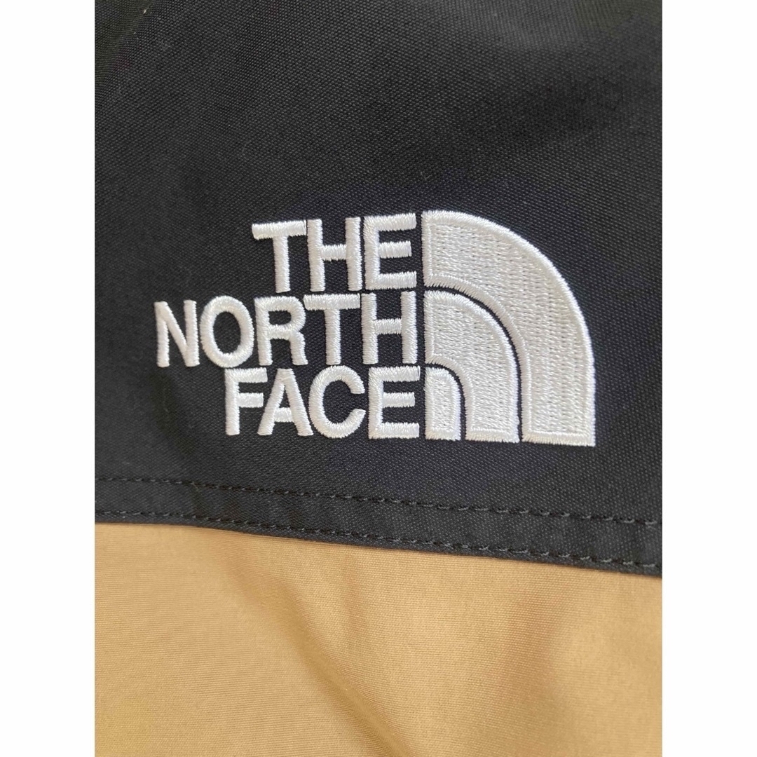 THE NORTH FACE(ザノースフェイス)の値下げ　ノースフェイス　マウンテンダウンジャケット　M　ユーティリティブラウン メンズのジャケット/アウター(ダウンジャケット)の商品写真