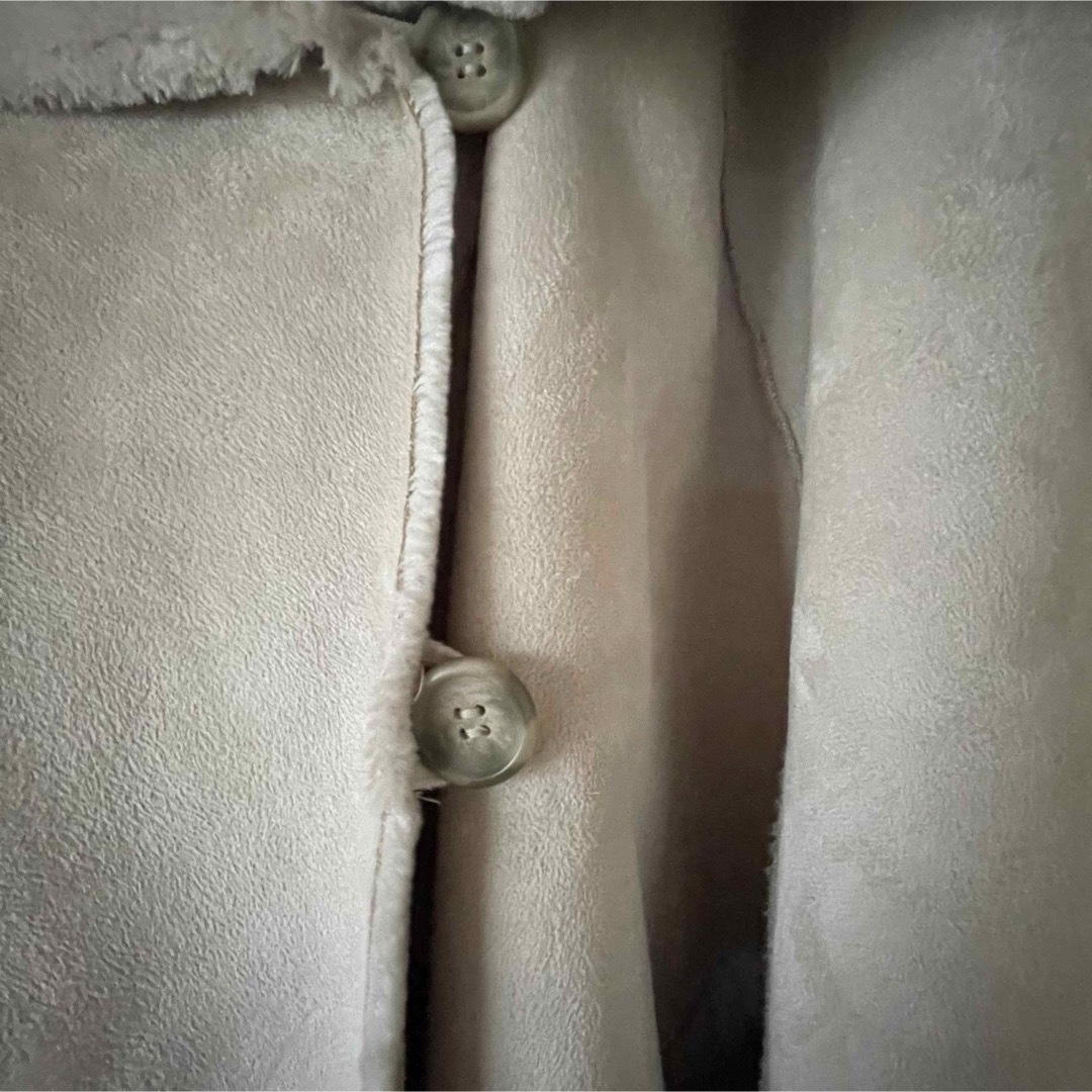 Doux archives(ドゥアルシーヴ)の[極美品]Doux archives ドゥアルシーヴ　M  ポンチョ　ホワイト レディースのジャケット/アウター(ポンチョ)の商品写真