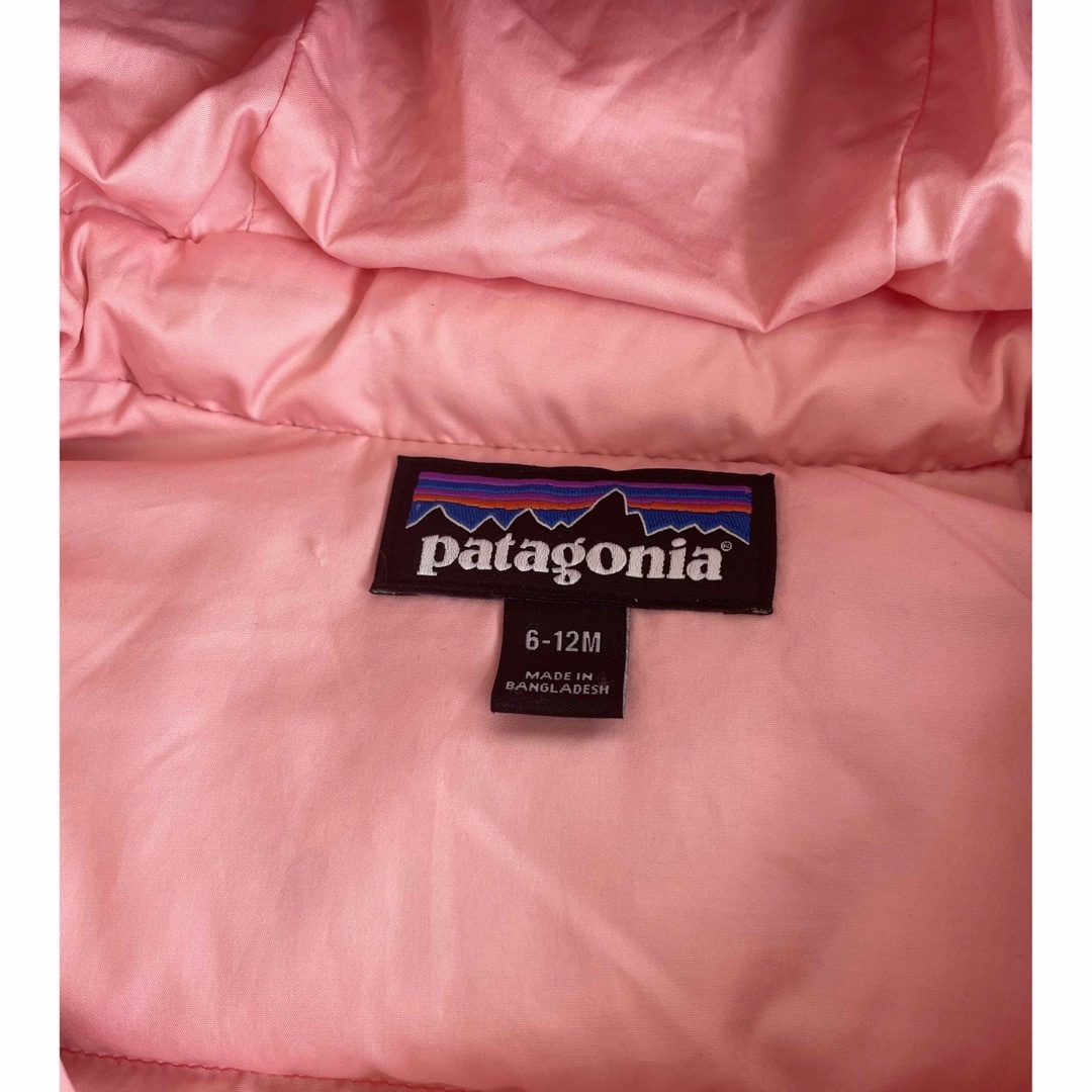 patagonia(パタゴニア)のパタゴニア　ダウン　オレンジ キッズ/ベビー/マタニティのベビー服(~85cm)(ジャケット/コート)の商品写真