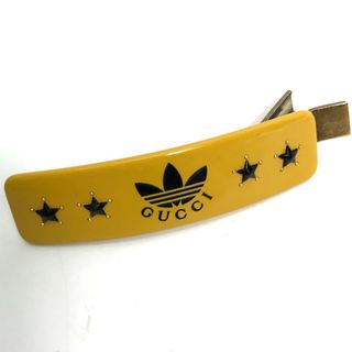 グッチ(Gucci)のグッチ GUCCI アディダス ADIDAS コラボ 702940 ヘアアクセサリー ヘアクリップ バレッタ プラスチック イエロー(バレッタ/ヘアクリップ)