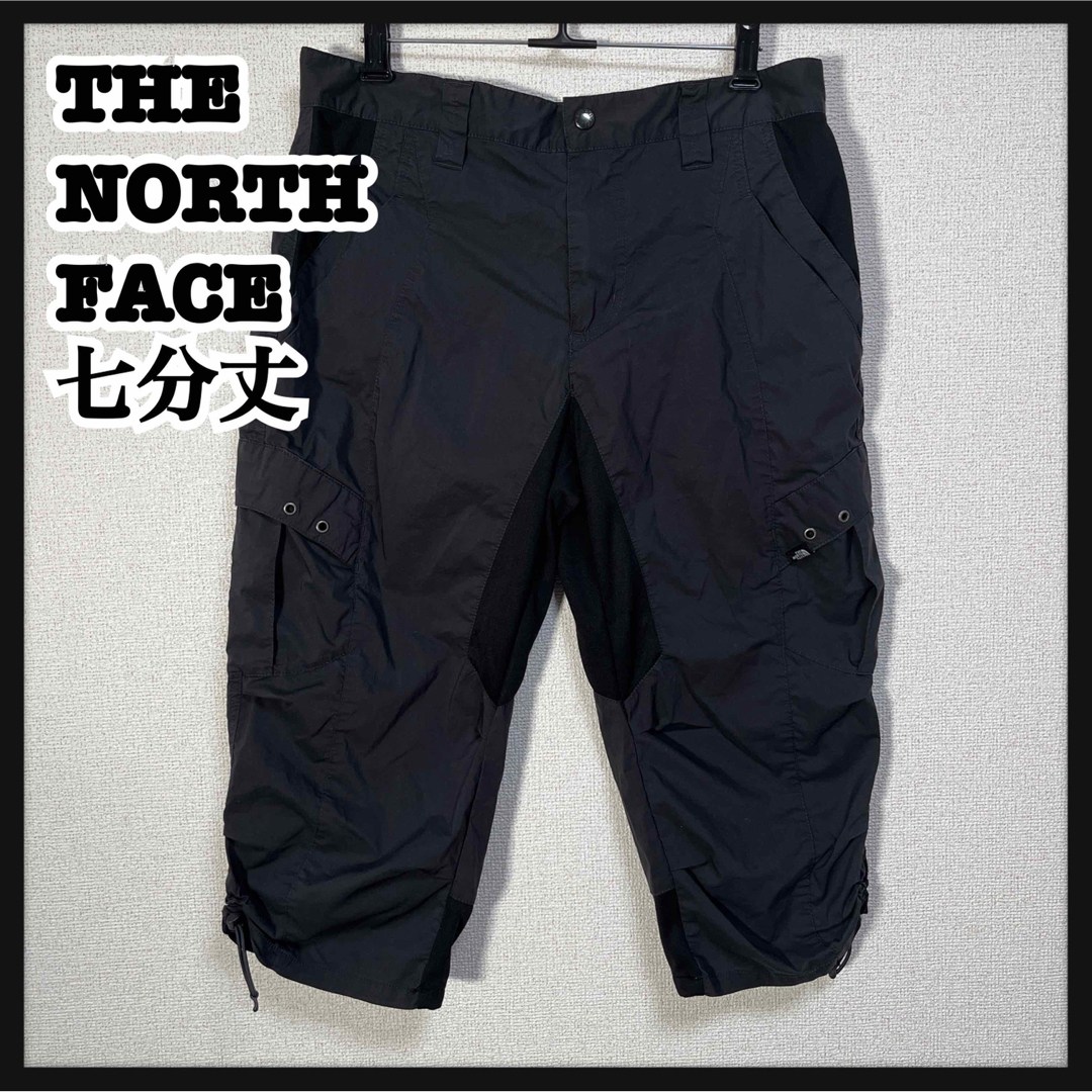 THE NORTH FACE(ザノースフェイス)の【ノースフェイス】ハーフパンツ　七分丈ズボン　黒グレー　ワンポイント　カーゴK1 メンズのパンツ(ショートパンツ)の商品写真