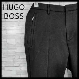 ヒューゴボス(HUGO BOSS)の【人気デザイン】ヒューゴボス☆メタルプレートロゴ付コットンスラックス　44　黒(スラックス)