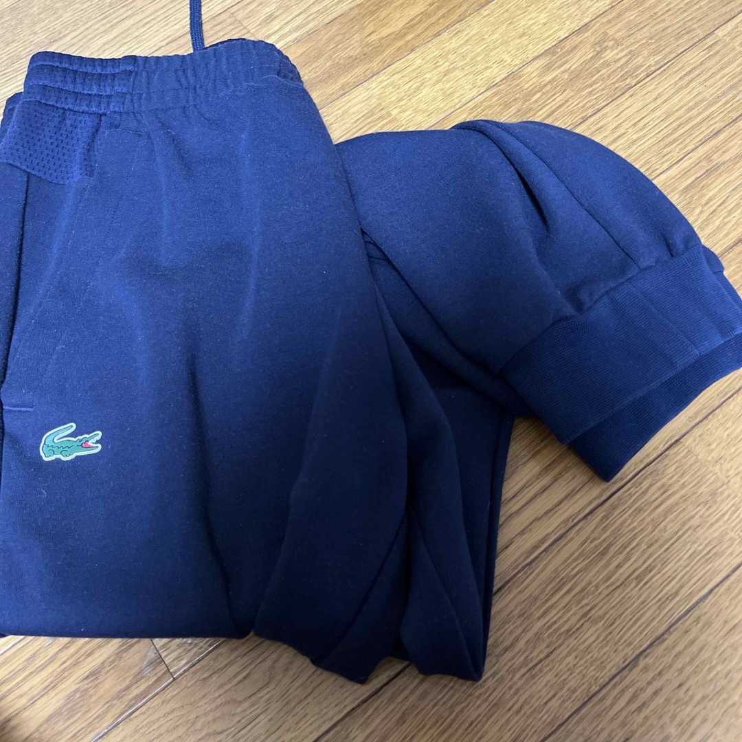 LACOSTE(ラコステ)の「コアパフォーマンス」バックヨークメッシュ切り替えトラックパンツ   メンズのトップス(ジャージ)の商品写真