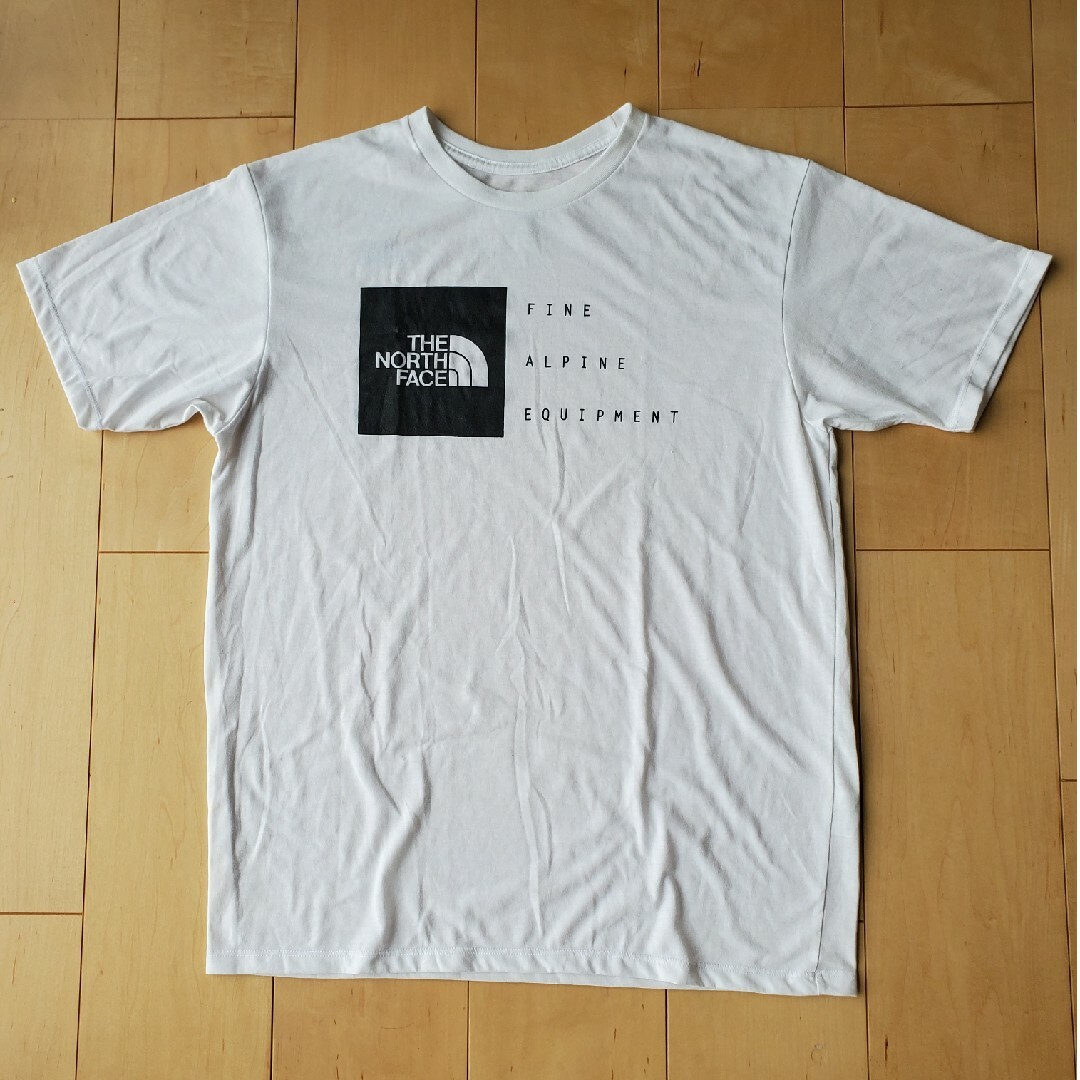 THE NORTH FACE(ザノースフェイス)の【送料無料】ノースフェイス Tシャツ 白 メンズ L メンズのトップス(Tシャツ/カットソー(半袖/袖なし))の商品写真