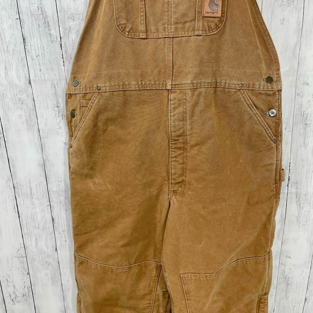 carhartt(カーハート)のビッグサイズダックオーバーオール　サイズ2ＸＬ　ウエスト106センチメンズ古着 メンズのパンツ(サロペット/オーバーオール)の商品写真