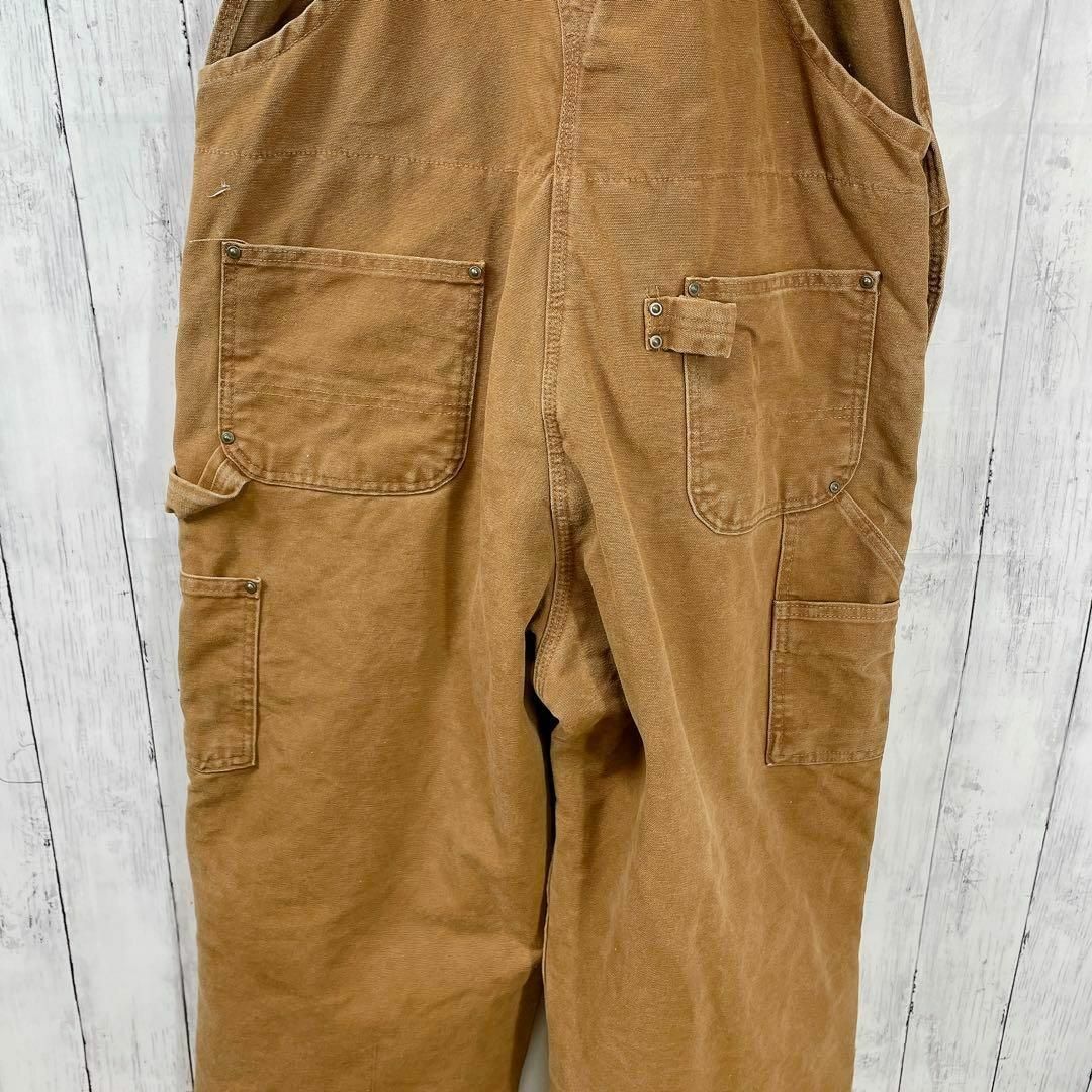 carhartt(カーハート)のビッグサイズダックオーバーオール　サイズ2ＸＬ　ウエスト106センチメンズ古着 メンズのパンツ(サロペット/オーバーオール)の商品写真