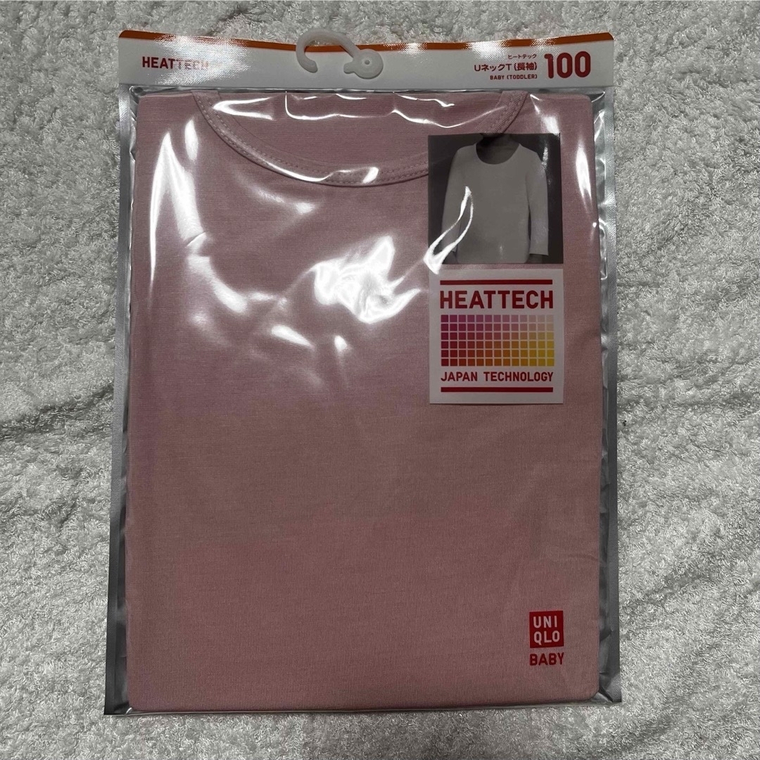 UNIQLO(ユニクロ)のヒートテック長袖　2枚セット サイズ100 (ピンク、白) キッズ/ベビー/マタニティのキッズ服女の子用(90cm~)(下着)の商品写真
