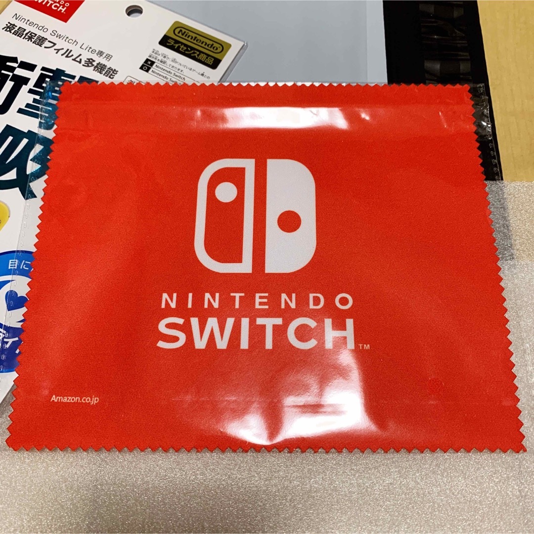 Nintendo Switch Lite専用 液晶保護フィルム ノベルティ付き エンタメ/ホビーのゲームソフト/ゲーム機本体(その他)の商品写真