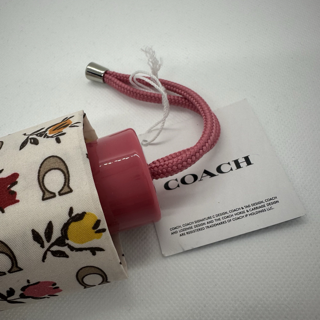 COACH(コーチ)の【USA輸入】コーチ　傘　日傘　雨傘　花柄　レディース　レイングッズ　ホワイト レディースのファッション小物(傘)の商品写真