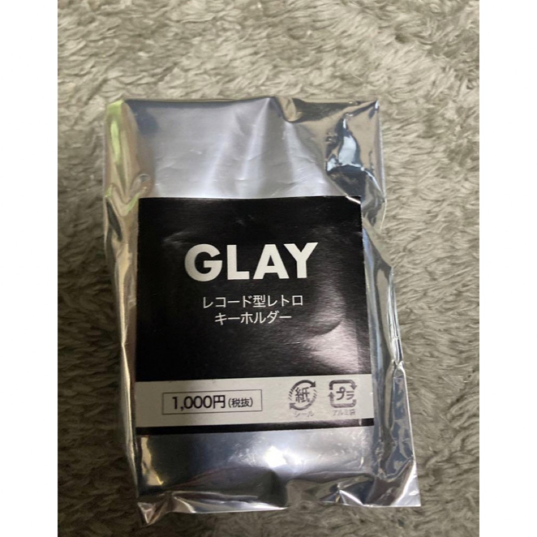 HMV限定 GLAYレトロ型キーホルダー単体 ランダム1点 新品未開封 エンタメ/ホビーのタレントグッズ(アイドルグッズ)の商品写真