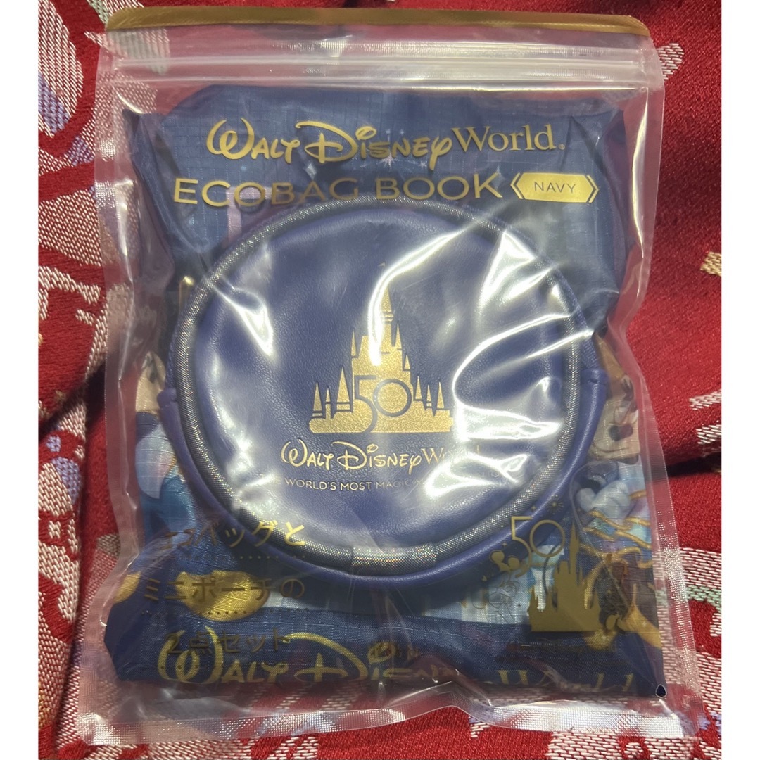 Disney(ディズニー)のディズニーワールドエコバッグブック ネイビー エコバッグ エンタメ/ホビーのおもちゃ/ぬいぐるみ(キャラクターグッズ)の商品写真