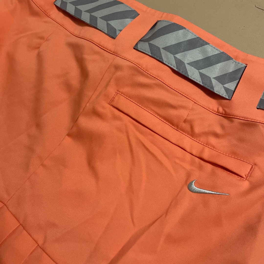 NIKE(ナイキ)のNIKEgolfサーモンピンクパンツセットスカート新品未開封 スポーツ/アウトドアのゴルフ(ウエア)の商品写真