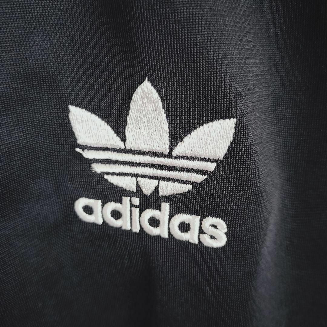 Originals（adidas）(オリジナルス)のアディダス 黒 花柄 スーパースター型 トラックトップ SST ジャージ 女性M メンズのトップス(ジャージ)の商品写真