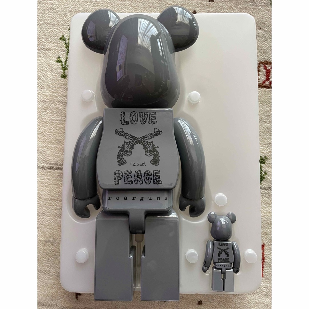 BE@RBRICK(ベアブリック)の【新品】BE@RBRICK roarguns 20th Anniversary エンタメ/ホビーのおもちゃ/ぬいぐるみ(その他)の商品写真