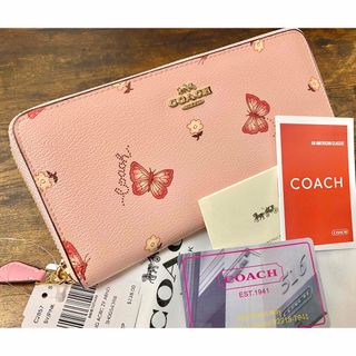 コーチ(COACH)の【新品】COACH ベビーピンク 蝶柄 ラウンドジップレザーウォレット(財布)