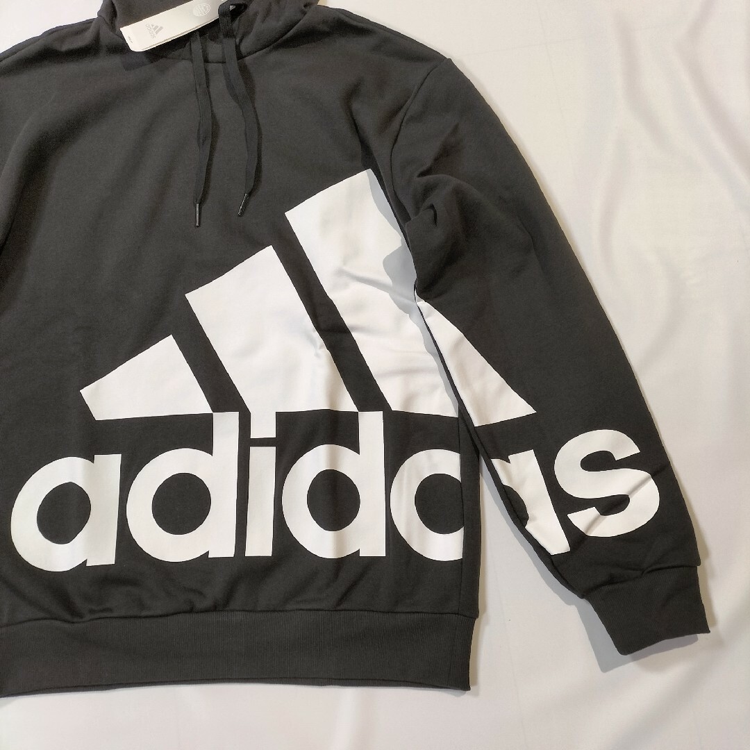 adidas(アディダス)の新品　アディダス　エッセンシャルズ　フリースパーカー　スウェットフーディー　L メンズのトップス(パーカー)の商品写真