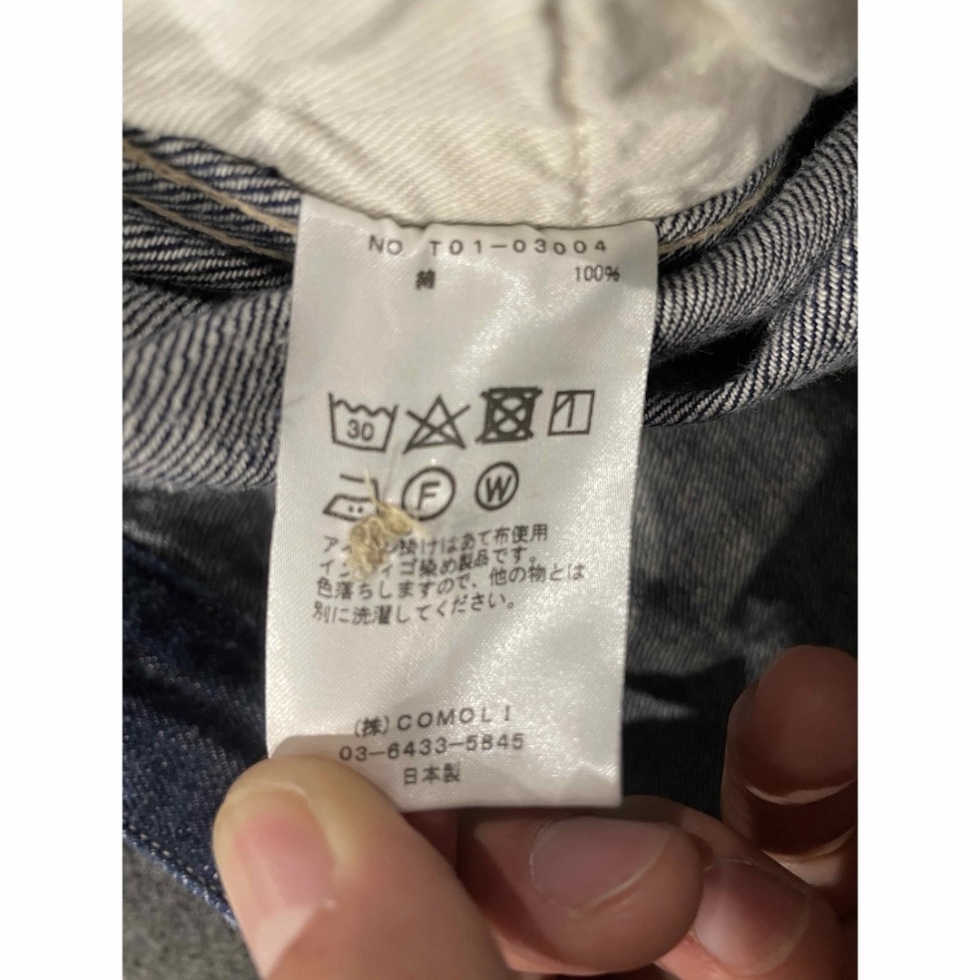 COMOLI(コモリ)の【最安値・未使用】コモリ　ベルテッドパンツ　インディゴ　サイズ3　タグあり メンズのパンツ(デニム/ジーンズ)の商品写真