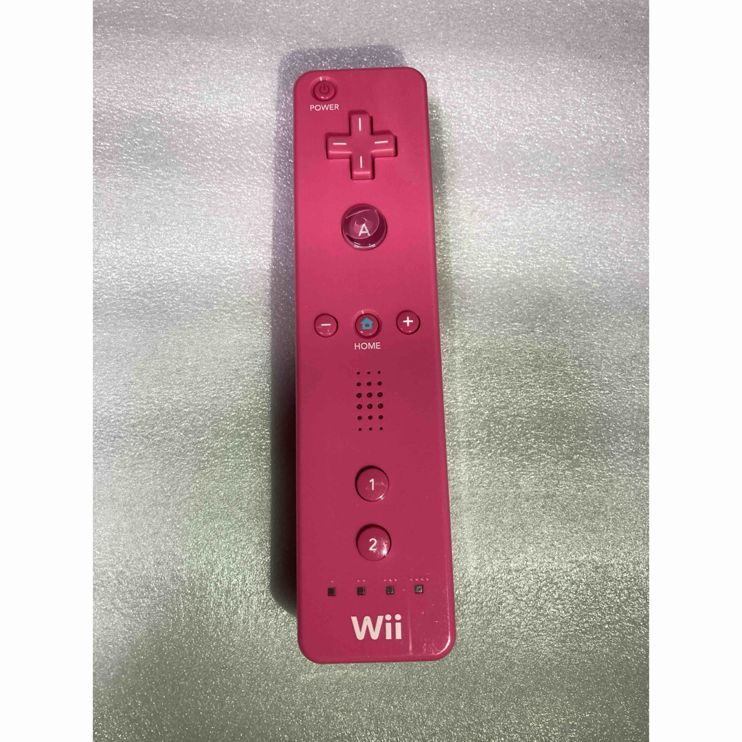 Wii(ウィー)の任天堂 Wiiリモコン ピンク RVL-003 エンタメ/ホビーのゲームソフト/ゲーム機本体(その他)の商品写真