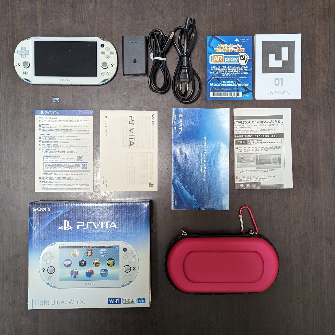 PlayStation Vita(プレイステーションヴィータ)のPS Vita 本体　PCH-2000ZA14 ライトブルー　メモリカード8G付 エンタメ/ホビーのゲームソフト/ゲーム機本体(携帯用ゲーム機本体)の商品写真