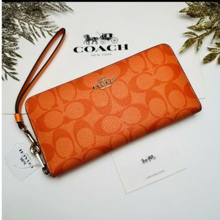 コーチ(COACH) シグネチャー 財布(レディース)（オレンジ/橙色系）の 