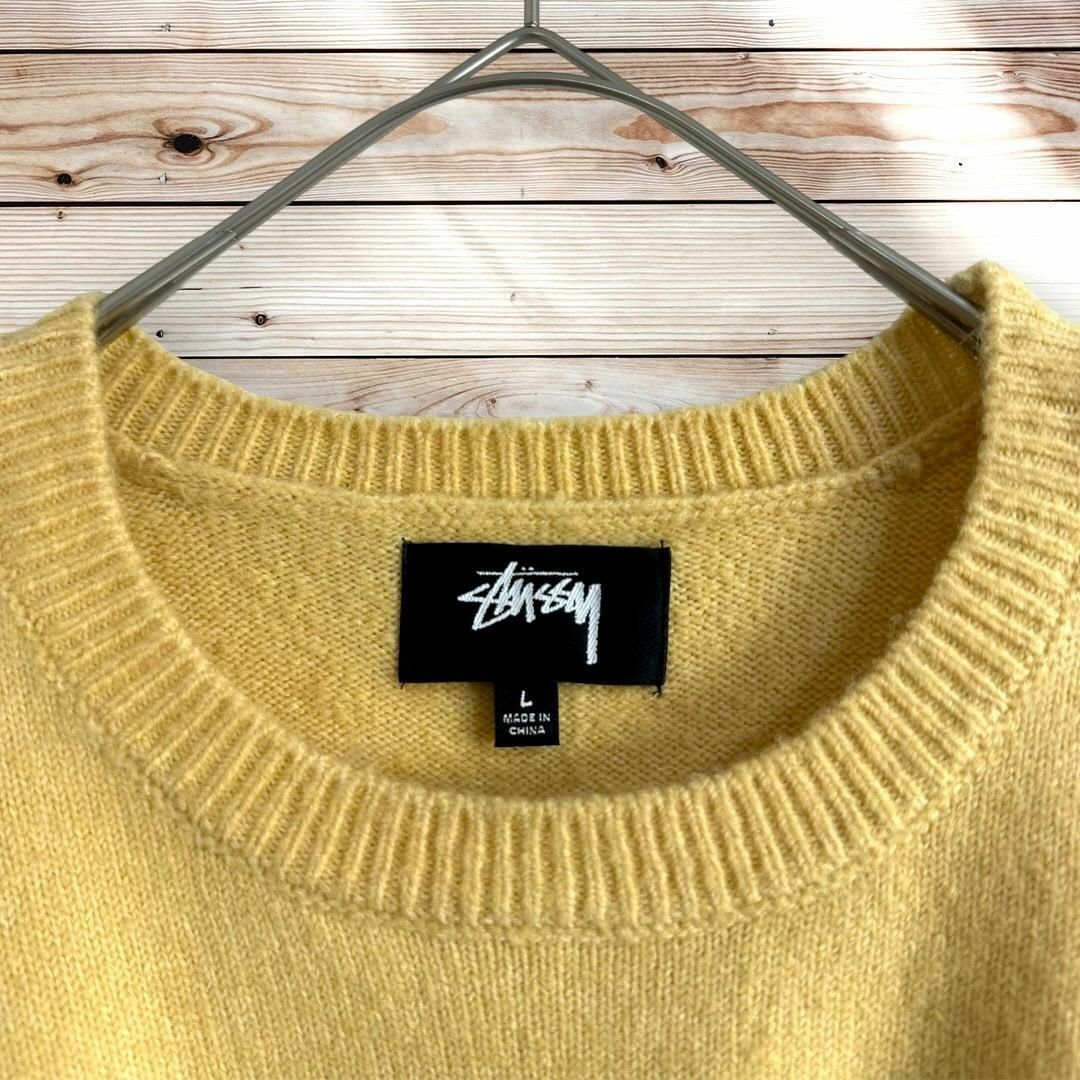 STUSSY(ステューシー)の【現行タイプ最高カラー】ステューシー バックロゴ入り セーター ニット 入手困難 メンズのトップス(ニット/セーター)の商品写真