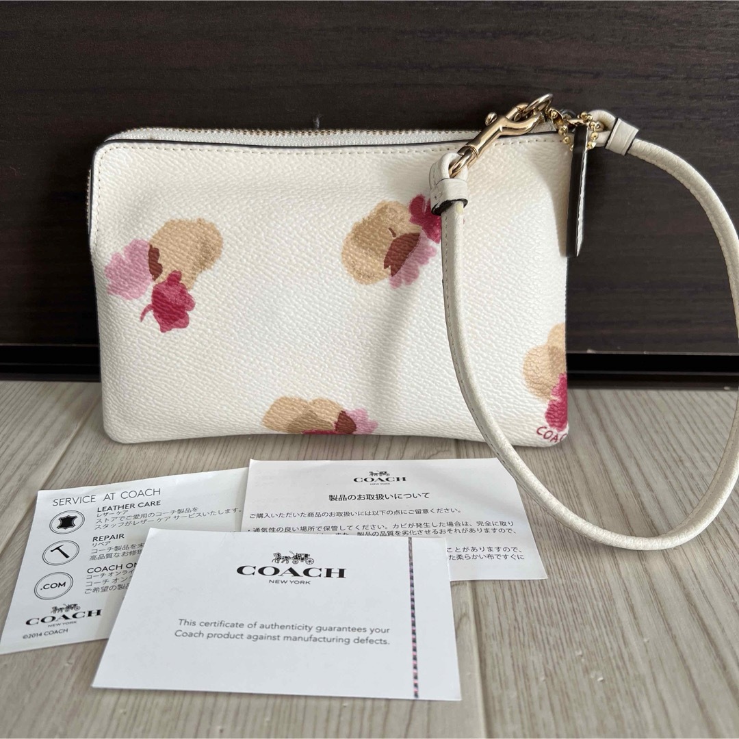 COACH(コーチ)のCOACH 花柄ポーチ レディースのファッション小物(ポーチ)の商品写真