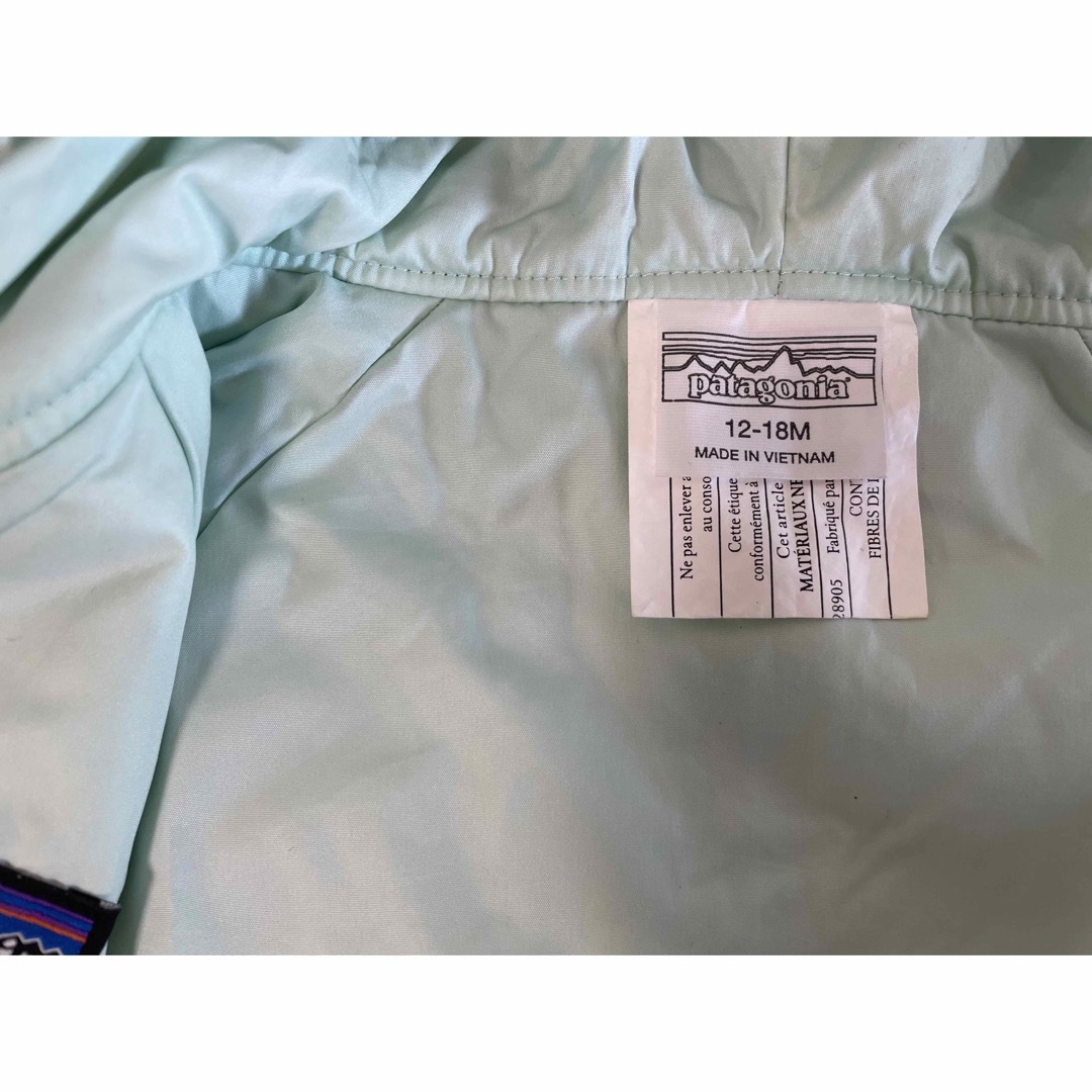 patagonia(パタゴニア)のPatagonia パタゴニアベビー リバーシブル パフボールジャケット キッズ/ベビー/マタニティのベビー服(~85cm)(ジャケット/コート)の商品写真