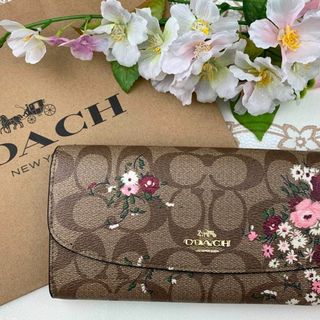 コーチ(COACH)のCOACH シグネチャー ベージュ 花柄 フラップ開閉(財布)