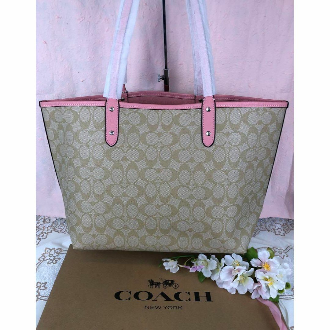 馬車COACH トートバッグ ピンク ベージュ シグネチャー リバーシブル