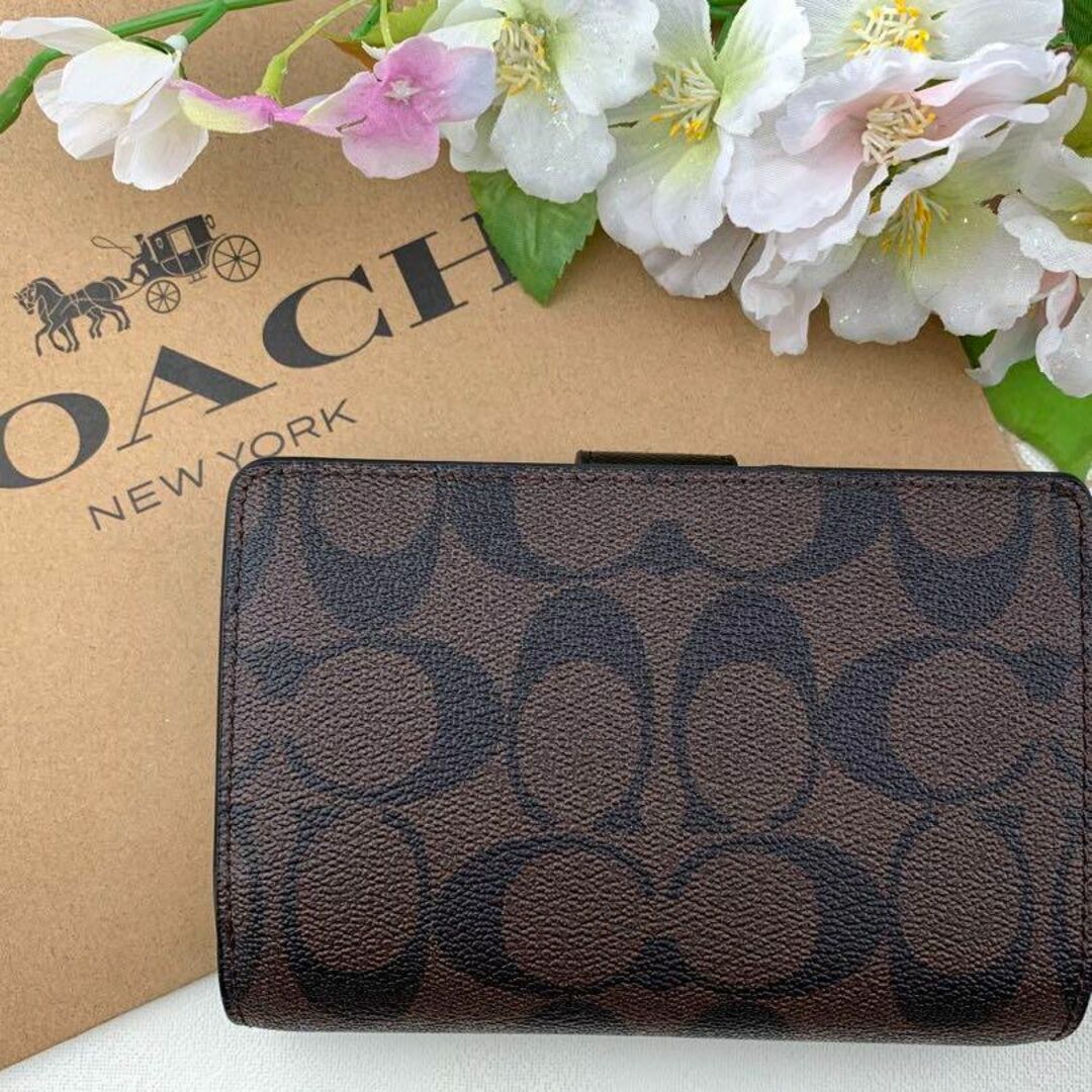 COACH(コーチ)のCOACH シグネチャー × ブラウン ブラック 二つ折り レディースのファッション小物(財布)の商品写真