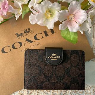 コーチ(COACH)のCOACH 二つ折りブラック ダークブラウン ベルトロゴ(財布)