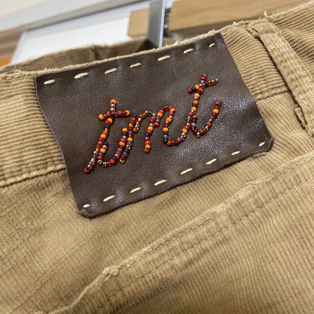 TMT(ティーエムティー)のティエムティー TMT ダメージ加工 ビーズ刺繍 コーデュロイパンツ Lサイズ メンズのパンツ(デニム/ジーンズ)の商品写真