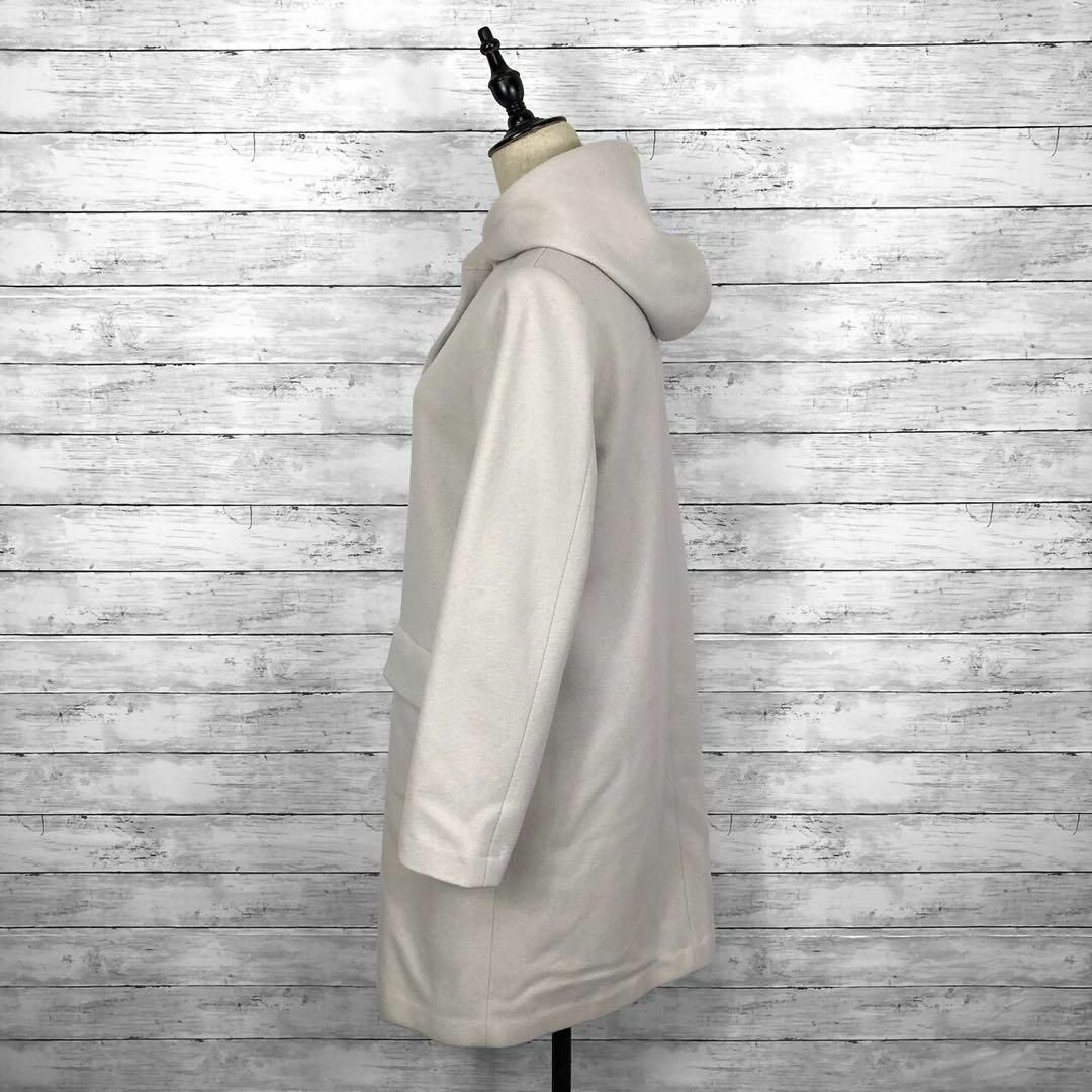 Theory luxe(セオリーリュクス)のセオリーリュクス ラムウール メルトンフーディーコート オフホワイト 38サイズ レディースのジャケット/アウター(ロングコート)の商品写真