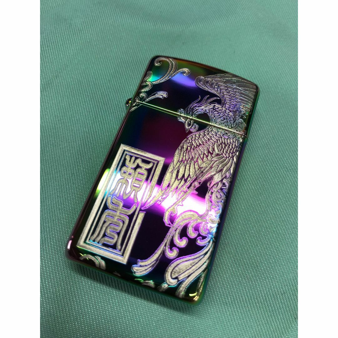 ZIPPO(ジッポー)のジッポ　スペクトラムスリム マルチカラー 鳳凰・名前・zippo 孔雀　朱雀 メンズのファッション小物(タバコグッズ)の商品写真