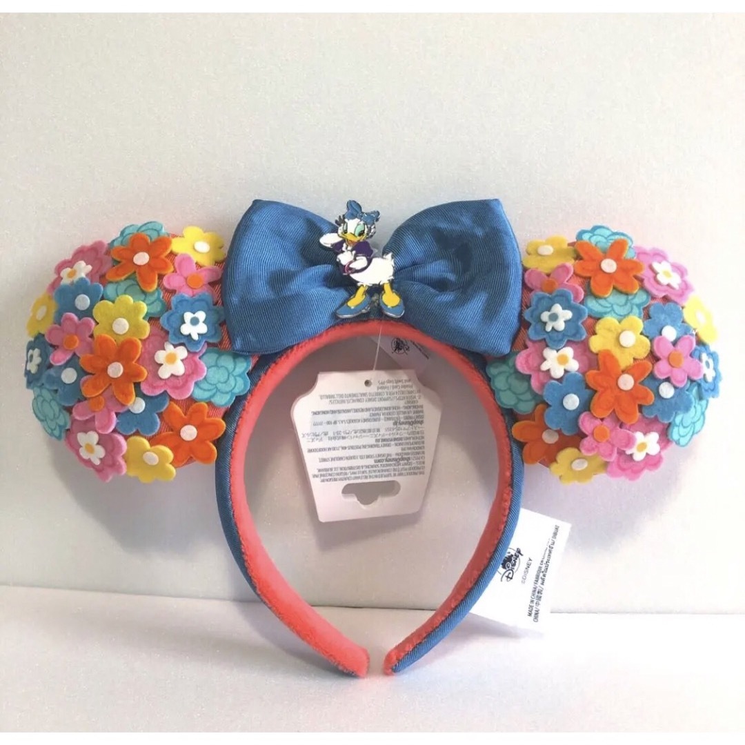 Disney(ディズニー)の日本未発売☆ミニーマウス　デイジー　フラワー　カチューシャ レディースのヘアアクセサリー(カチューシャ)の商品写真