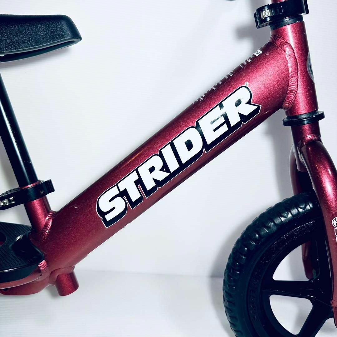 STRIDA(ストライダ)のストライダー STRIDER12 PRO メタリックマルーン 付属品付 アルミ製 キッズ/ベビー/マタニティの外出/移動用品(自転車)の商品写真