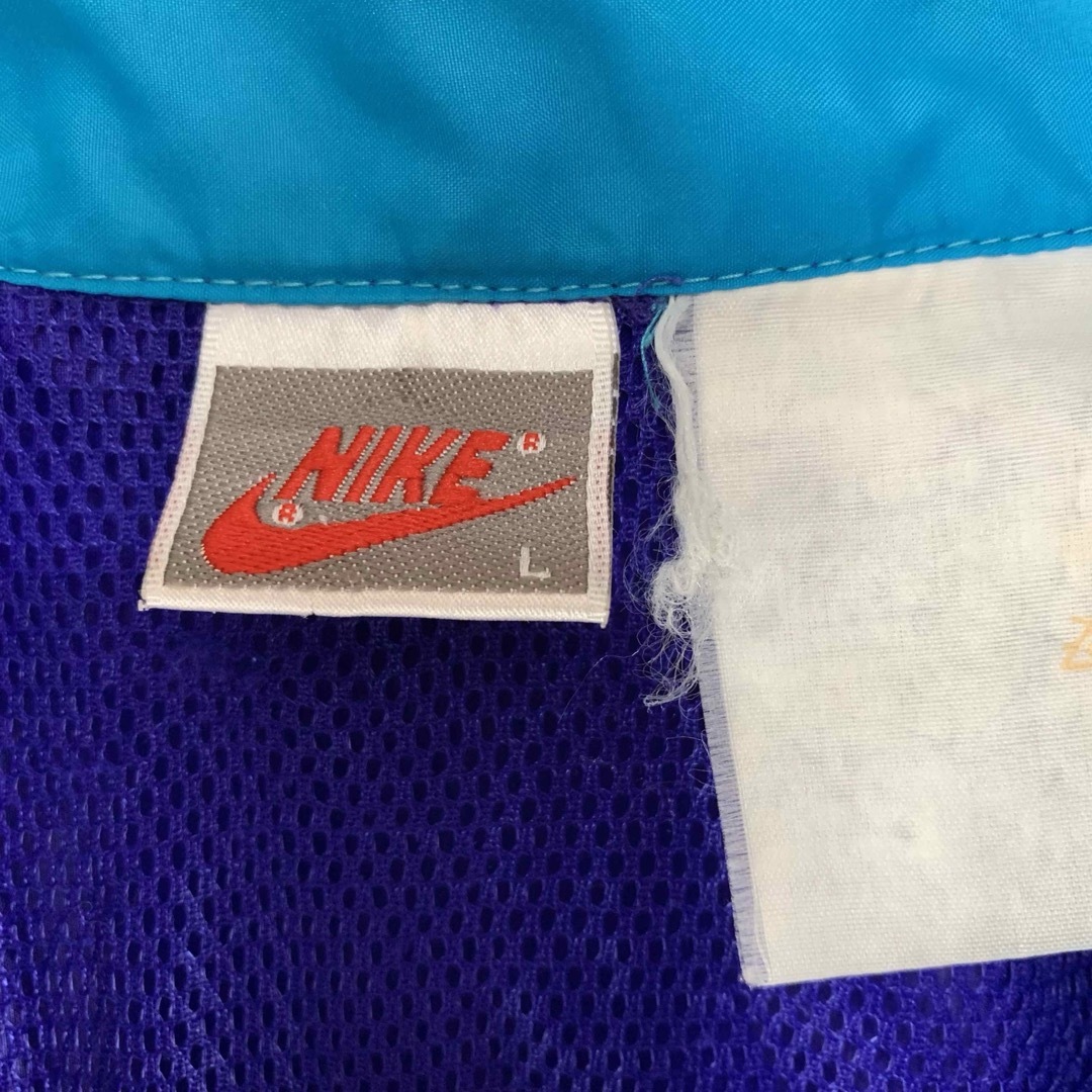 NIKE(ナイキ)の【希少】ナイキ　90s　銀タグ　マルチカラー　刺繍ロゴ　青　ナイロンジャケット メンズのジャケット/アウター(ナイロンジャケット)の商品写真