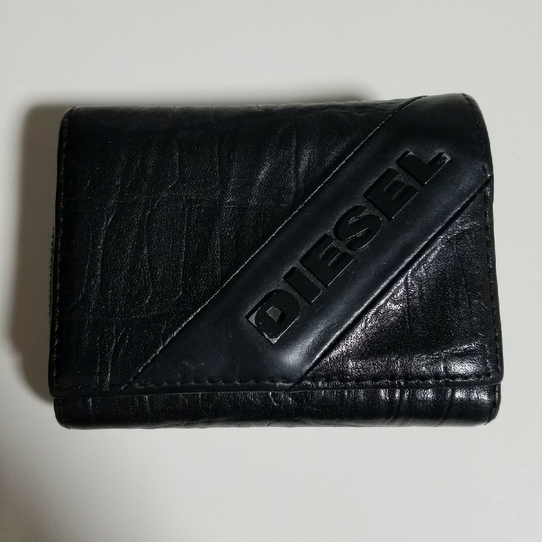 DIESEL(ディーゼル)のDIESEL　ﾃﾞｨｰｾﾞﾙ　ミニ財布 メンズのファッション小物(折り財布)の商品写真