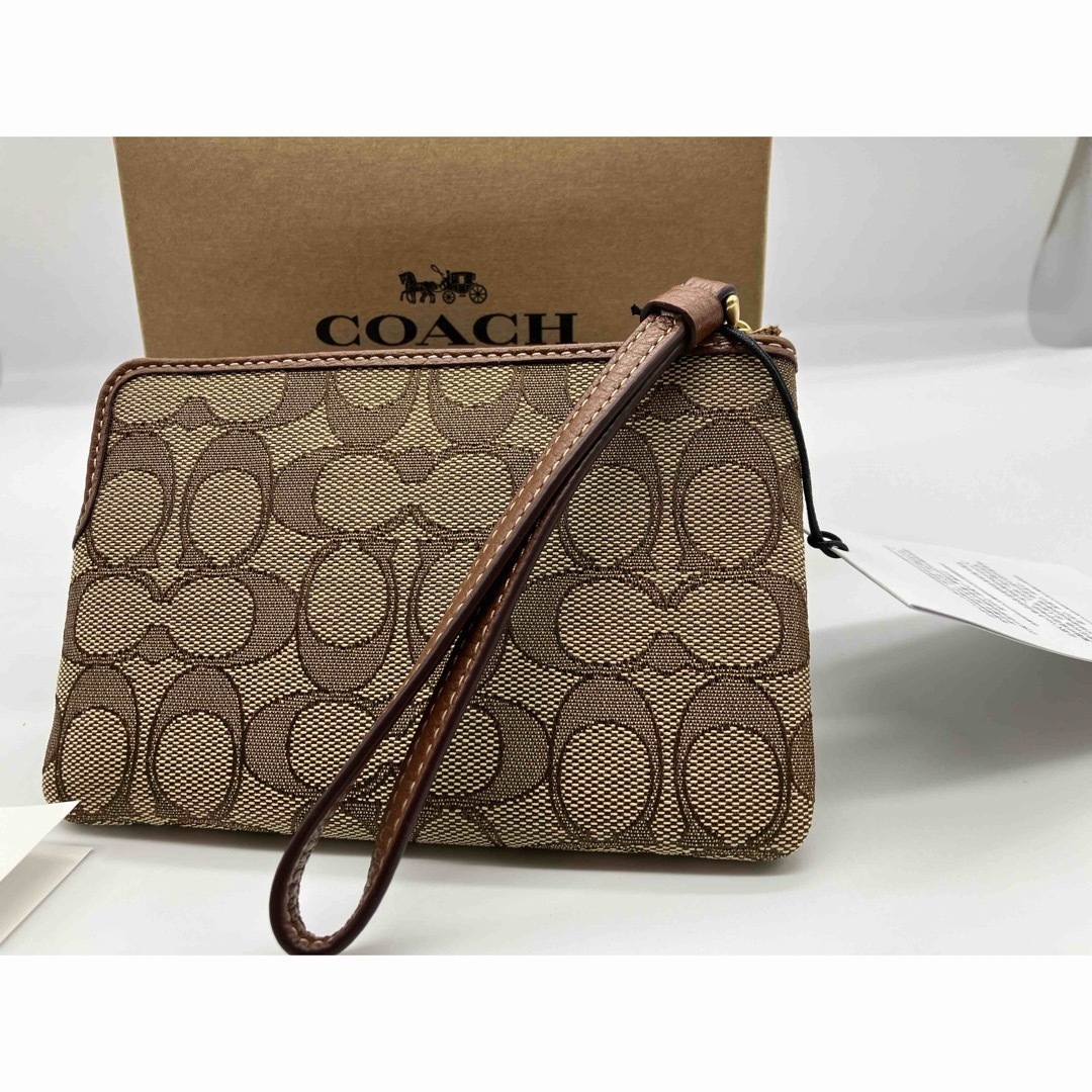 COACH(コーチ)のCOACH【CN033】Disneyコラボ　コーナー ジップ リストレット レディースのファッション小物(ポーチ)の商品写真