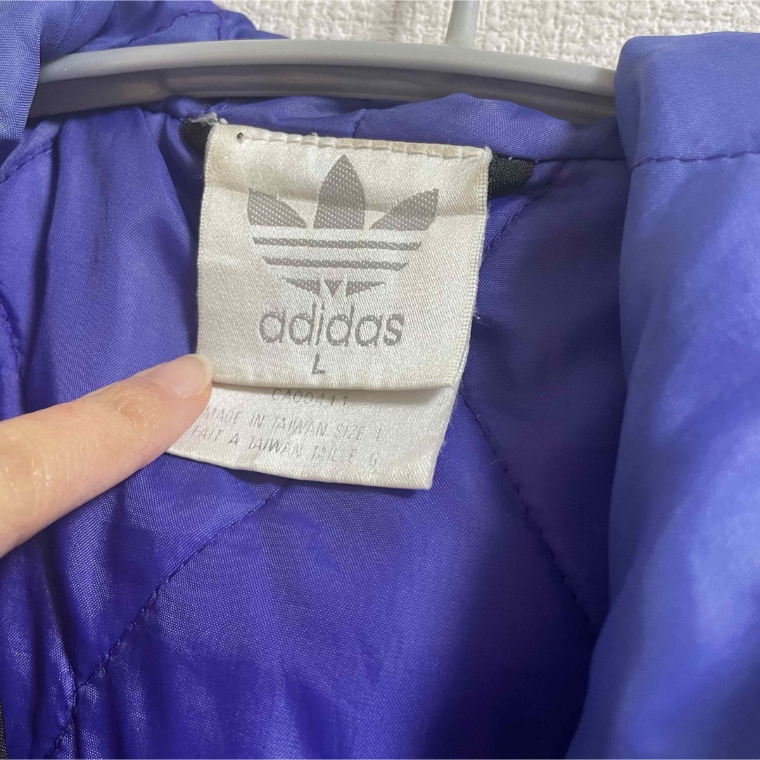 adidas(アディダス)のadidas ヴィンテージ アウター 万国旗タグ レディースのジャケット/アウター(ナイロンジャケット)の商品写真