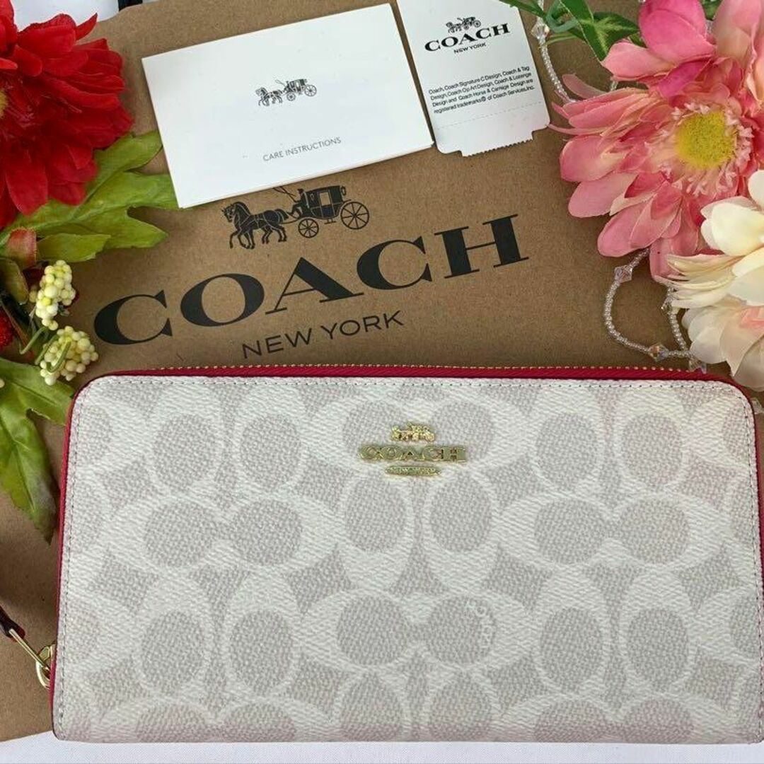 ディズニーCOACH コーチ 長財布 シグネチャー ホワイト パッションピンク