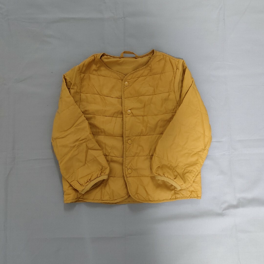 UNIQLO(ユニクロ)のユニクロ　ライトウォームパデッドコンパクトジャケット90サイズYellow キッズ/ベビー/マタニティのキッズ服男の子用(90cm~)(ジャケット/上着)の商品写真