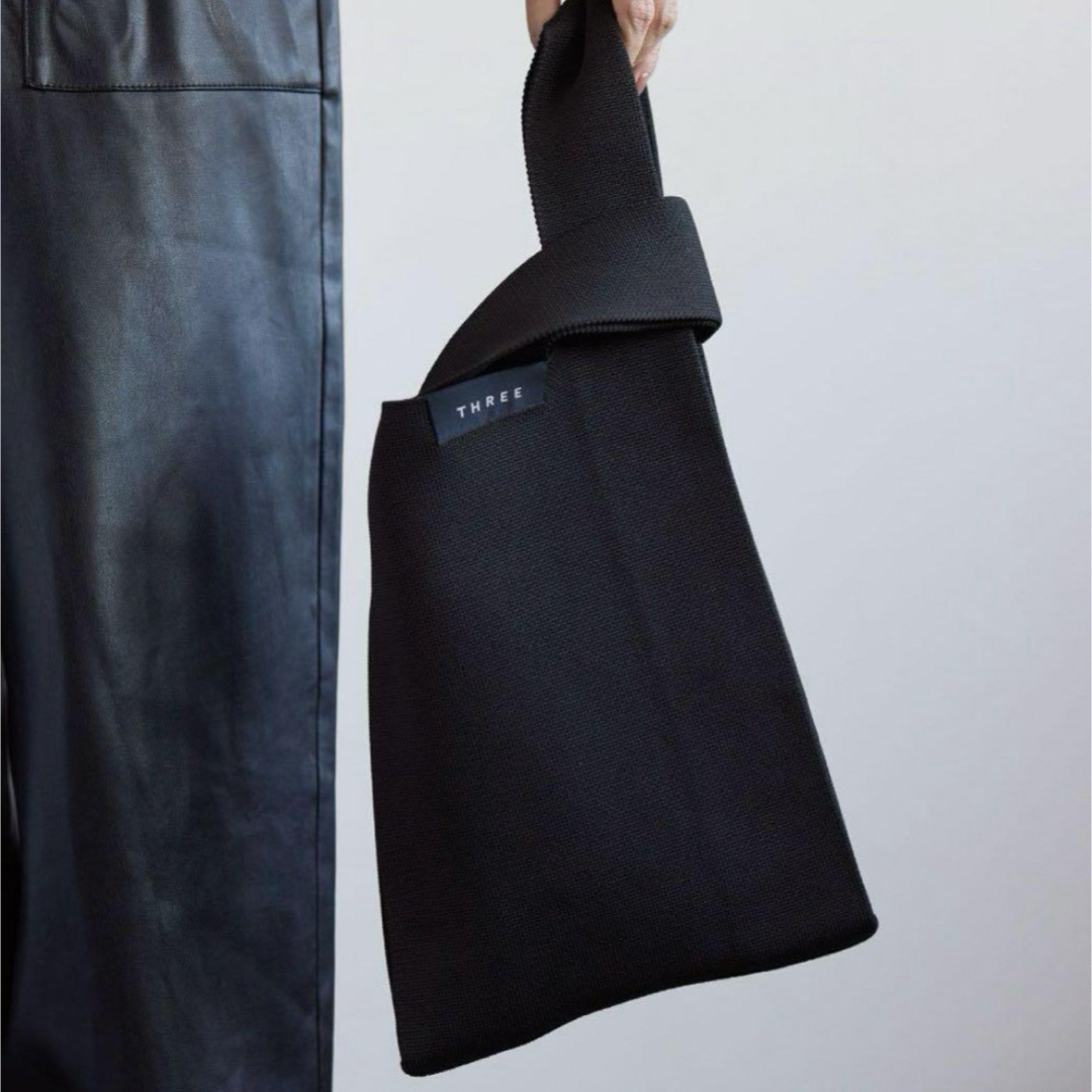 THREE(スリー)の新品☆THREE 　スリー　オリジナルニットバッグ＆タオルセット　ノベルティ レディースのバッグ(トートバッグ)の商品写真