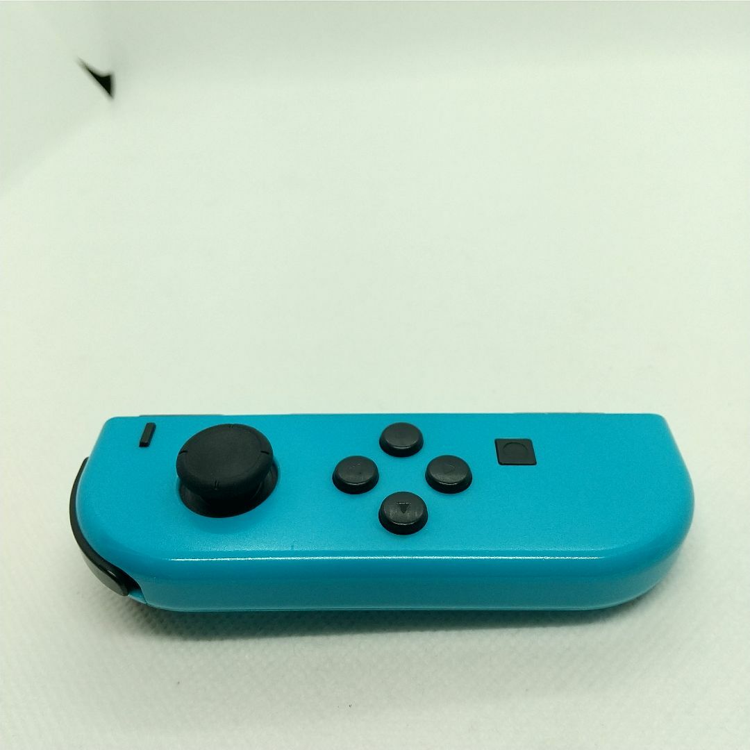 Nintendo Switch(ニンテンドースイッチ)の【定番】⑧Switch ジョイコン　ネオンブルー　左のみ(L)【任天堂純正品】青 エンタメ/ホビーのゲームソフト/ゲーム機本体(家庭用ゲーム機本体)の商品写真