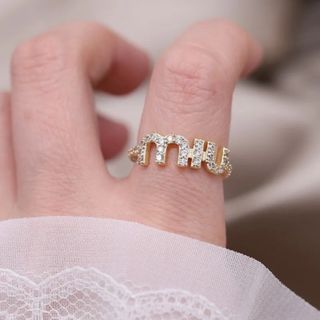 k18wg    曲線美のリング ダイヤモンド 0.35ct