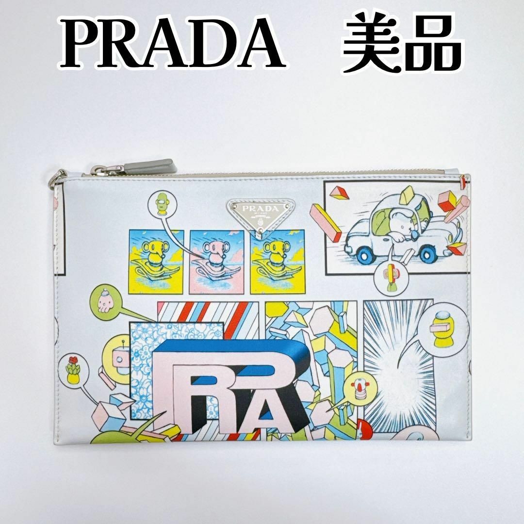 PRADA(プラダ)の【希少】プラダ クラッチバッグ 三角プレート マルチカラー コミックプリント レディースのバッグ(クラッチバッグ)の商品写真