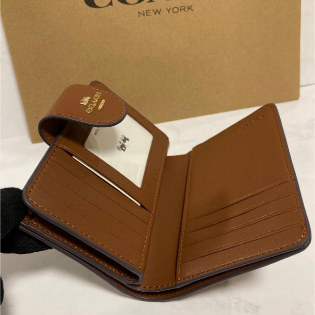 COACH(コーチ)の新品　COACH 二つ折り財布 ブラック ブラウン シグネチャー　小銭入れ有 レディースのファッション小物(財布)の商品写真